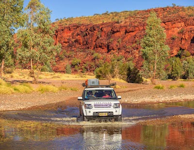vehicle with reds w Finke River
